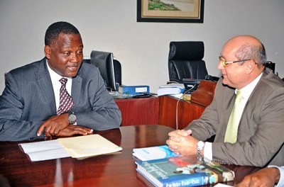 Industry Minister, Donville Inniss and Cuban Ambassador, Francisco Fernandez Pena in discussion during their meeting at the Reef Road today. (Photo via A.Miller/BGIS)