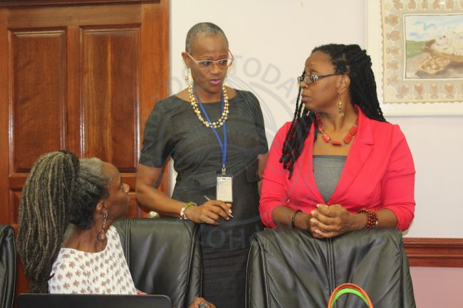 Administrative Officer in the Ministry of Culture Rhonda Greenidge (centre) holds the attention of the Director of the Barbados Cultural Industries Development Authority Andrea King (left) and Chief Cultural Officer at the NCF Andrea Wells (right). (Photo via Barbados Today)