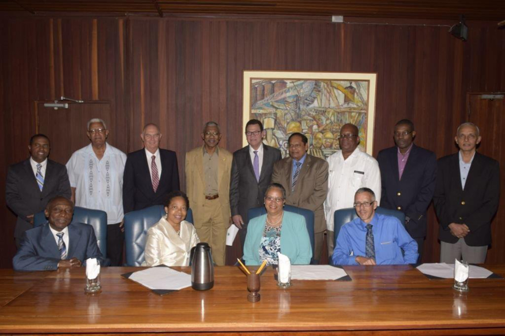CAPTION: (Backrow, L-R) Dr. Justin Ram, Director of Economics, CDB; Minister of Agriculture, Noel Holder; Andrew Dupigny, Director of Projects (Ag), CDB; President of Guyana, His Excellency Brigadier David Granger; CDB President, Dr. William Warren Smith;  Prime Minister, Moses Nagamootoo; Minister of Finance, Winston Jordan; Minister of Public Infrastructure, David Patterson; and Minister of Communities, Ronald Bulkan. (Seated, L-R) Foreign Affairs Minister, Carl Greenidge; Patricia McKenzie, Vice-President (Operations), CDB; Monica La Bennett, Deputy Director, Corporate Planning, CDB; and Minister of Business and Investment, Dominic Gaskin. (Photo via CDB)