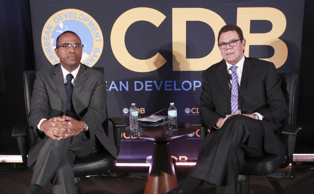 Caribbean Development Bank's (CDB) President, Dr. Warren Smith (right) and Dr. Justin Ram, Director of Economics met with the journalists from across the Region to discuss the short to medium-term prospects for the economies of the Bank's borrowing member countries (BMCs). (Photo via CDB)