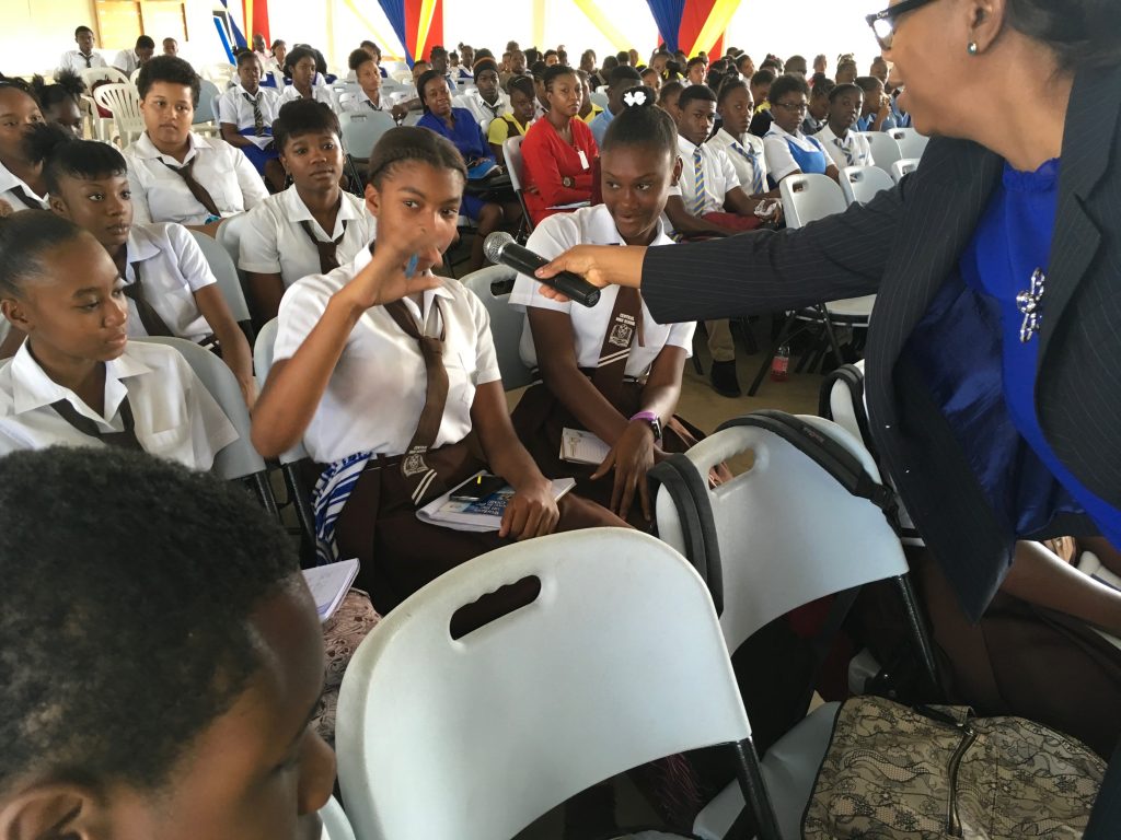 Jamaica's CSME Focal Point, Ms. Symone Betton-Nayo interacts with students