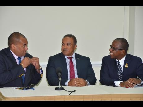 From left: Chairman of the Caribbean Tourism Organization (CTO), Richard Sealy; Curacao Minister of Economic Development, Stanley Palm and Executive Director of the CTO, Hugh Riley addressing media at a press conference at the SOTIC2015 at the World Trade Center in Willemstad, Curacao. (Photo by Janet Silvera via Jamaica Gleaner)