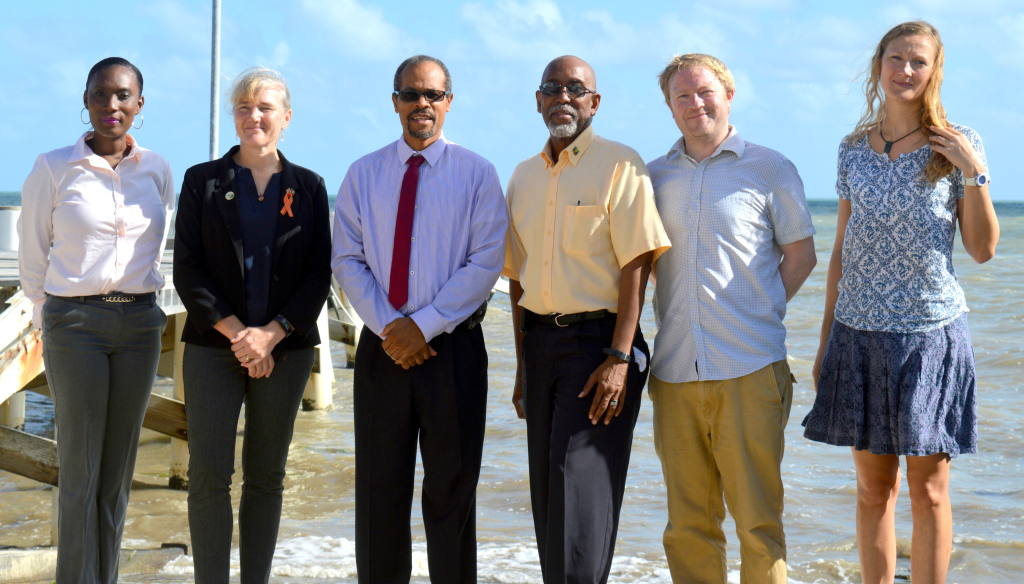 From left: Nadine Nembhard, Administrative Assistant of the Caribbean Network of Fisherfolk Organisations (CNFO); Grace Chun, Deputy High Commissioner at British High Commission based in Belmopan; Milton Haughton, Executive Director of the CRFM, Peter A. Murray, CRFM Programme Manager - Fisheries Management & Development; Paul Buckley, Marine Climate Change Project Coordinator (CEFAS); and Bryony Townhill, Marine Climate Change Scientist at CEFAS (Photo via CRFM)