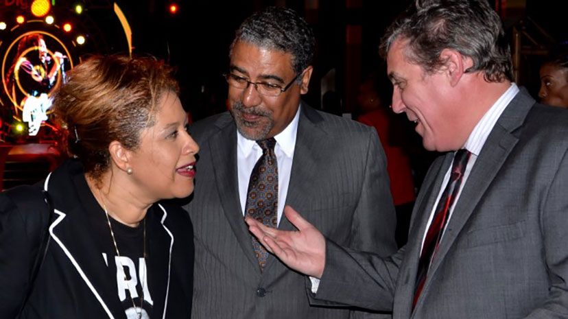 Tourism and Entertainment Minister, Dr. Wykeham McNeill (centre), listens as Digicel’s Chief Executive Officer, Barry O’Brien, makes a point to Bob Marley Group of Companies General Manager, Marie Bruce at Digicel’s regional headquarters, downtown Kingston.