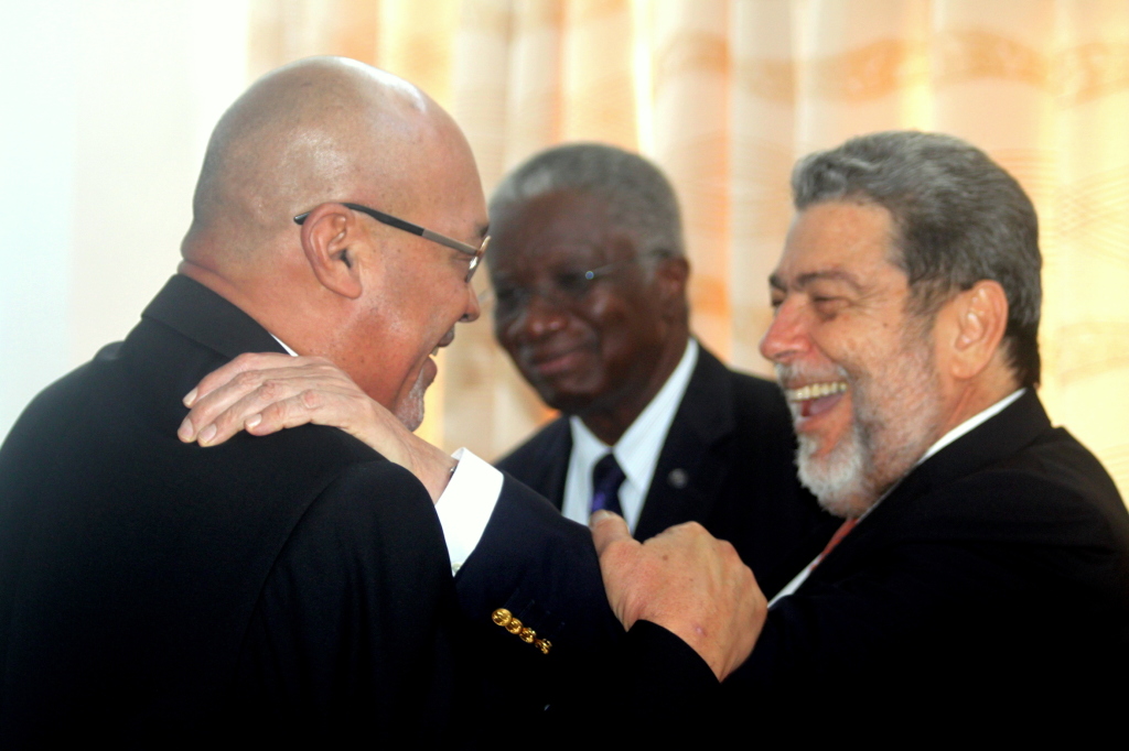Prime Minister Ralph Gonsalves of St. Vincent and the Grenadines (right) in good spirits with President Desi Bouterse of Suriname (left) and Prime Minister Freundel Stuart of Barbados