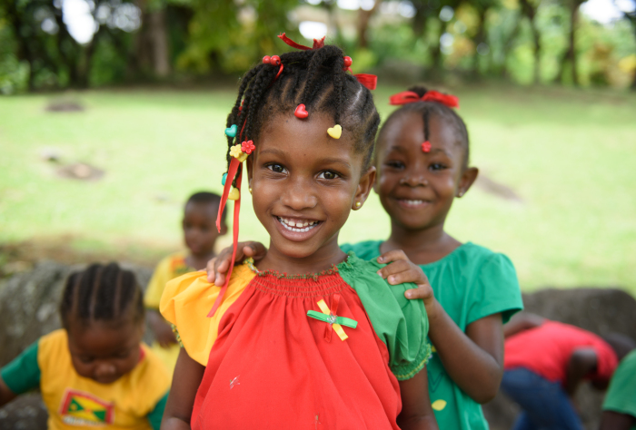 Children in the colours of Grenada (Photo via True Blue Bay Grenada)
