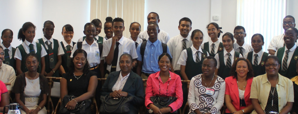 Secondary school students and teachers in Guyana with CARICOM Secretariat staff members