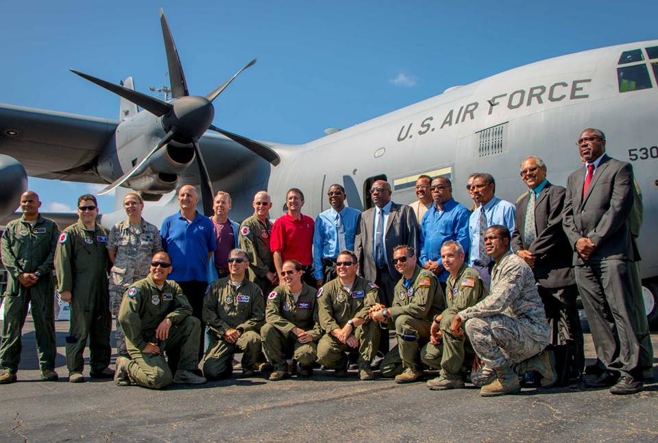 Local Government officials pose with Hurricane Hunters during their visit in April (Photo vis SKNIS)