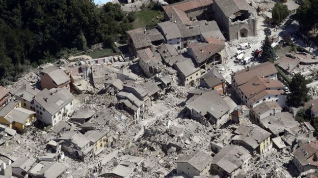 Amatrice: Most of the pretty, historic town is now rubble, blanketed in grey dust (Photo via BBC)