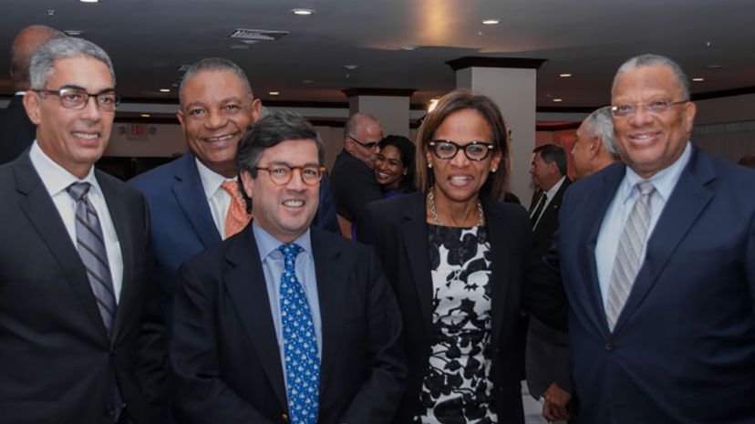 Finance and Planning Minister, Dr. the Peter Phillips (right); Minister with Responsibility for the Public Service, Ministry of Finance and Planning, Hon. Horace Dalley (2nd left); and Co-Chair, Economic Programme Oversight Committee (EPOC), Richard Byles (left), share a light moment with Inter-American Development Bank (IDB) President, Luis Alberto Moreno (centre); and IDB Country Representative in Jamaica, Therese Turner-Jones, during Friday’s (December 19) private sector luncheon at Knutsford Court Hotel, New Kingston.(JIS Photo)