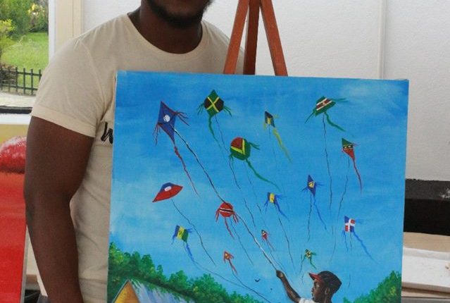 Belize What CARICOM Means to Me – artist and his painting