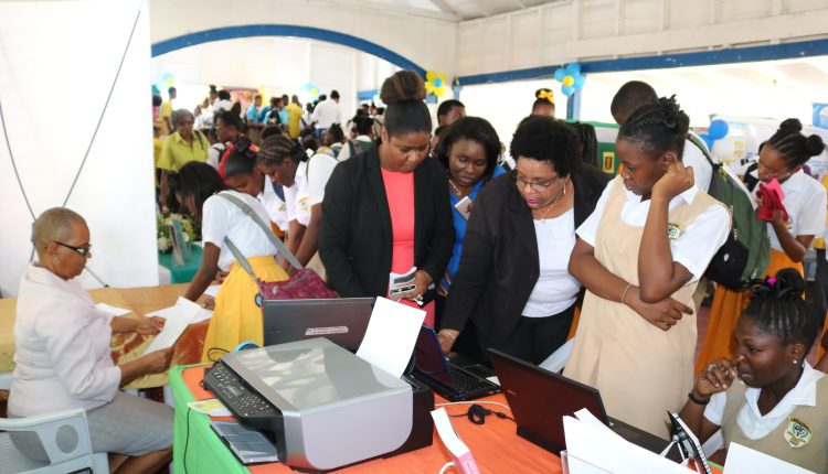 CCS Staff members interacting with students
