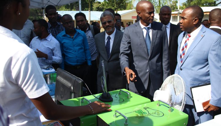CEM Launch – Haiti President views exhibition