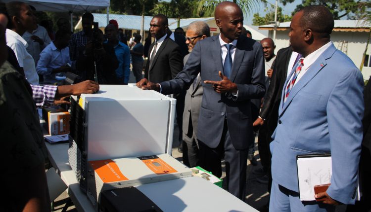 CEM Launch – Haiti President views exhibition and points