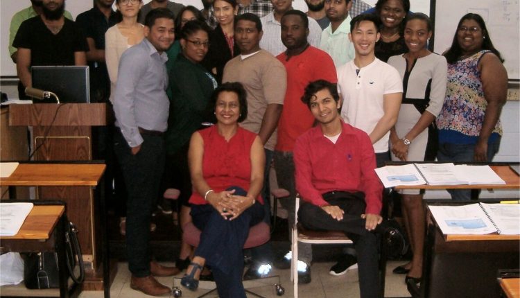 CEM Personality – Indra Haraksingh in group photo