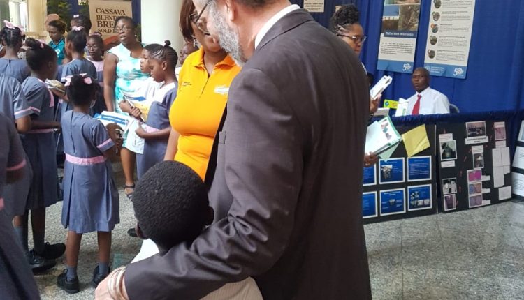 CWA Marketplace SG hugs child