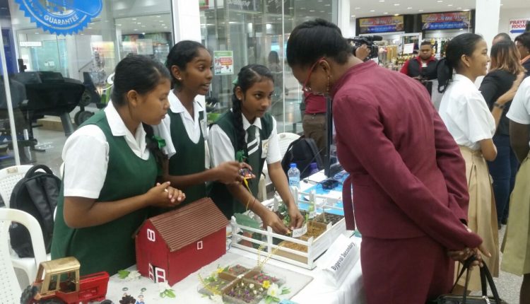 Girls in ICT GT students engage visitor