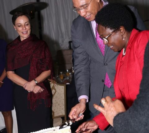 PM Holness sticks cake in South AFrica